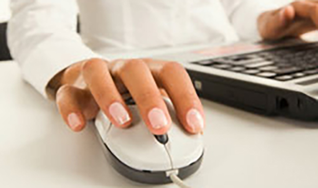 Image of right hand on a computer mouse
