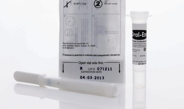 Image of a complete Oral-Eze collection system with packaging