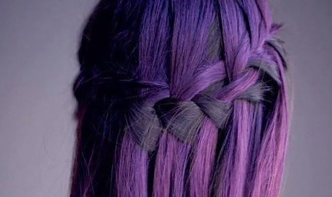 Woman with purple hair in a braid