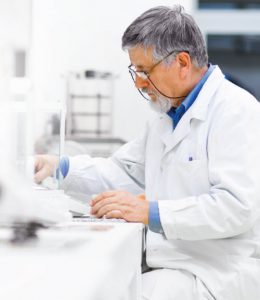 Man working at a Quest drug testing lab