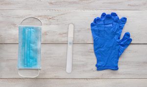 Gloves, face mask and Oral-Eze oral fluid drug test