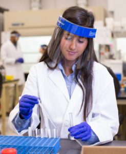 Woman working in a Quest drug testing lab